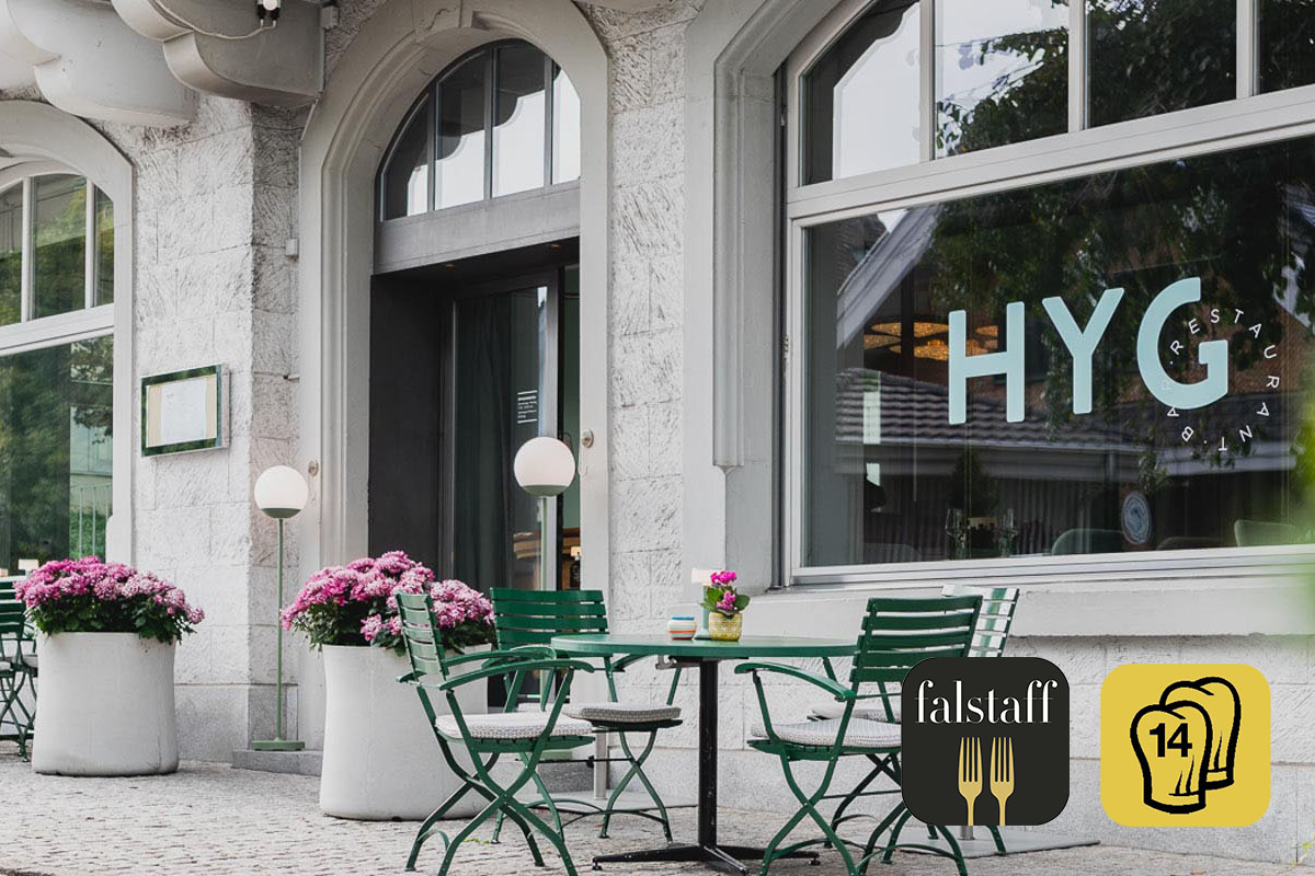 HYG Restaurant Bar in Weggis am Vierwaldstaettersee Restaurant Interior mit Gault Millau Pop Logo und Falstaff Landscape fuer Mobile 5 - HYG Restaurant & Bar