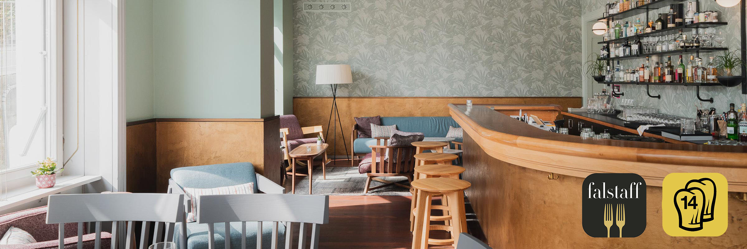 HYG Restaurant Bar in Weggis am Vierwaldstaettersee Restaurant Interior mit Gault Millau Pop Logo und Falstaff Logo 6 - HYG Restaurant & Bar