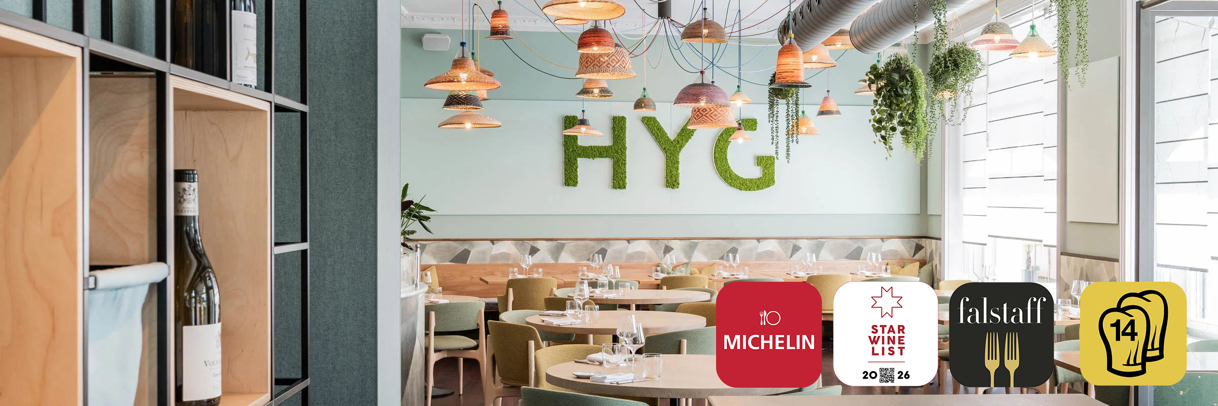 HYG Restaurant Bar in Weggis am Vierwaldstaettersee Restaurant Interior mit Gault Millau Pop Logo und Falstaff Logo 1 1 - HYG Restaurant & Bar