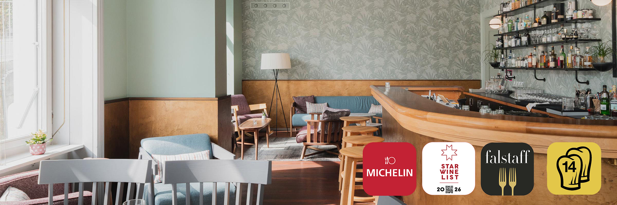 HYG Restaurant Bar in Weggis am Vierwaldstaettersee Restaurant Interior mit Gault Millau Pop Logo und Falstaff Logo 6 - HYG Restaurant & Bar